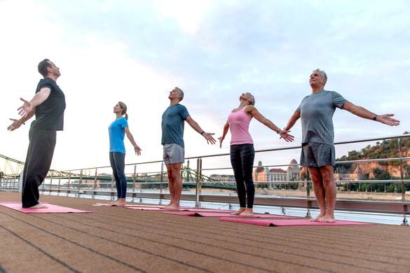 UNIWORLD Boutique River Cruises S.S. Maria Theresa Yoga on Sun Deck Lifestyle 1.jpg